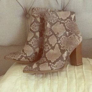 Carlos Santana snake booties